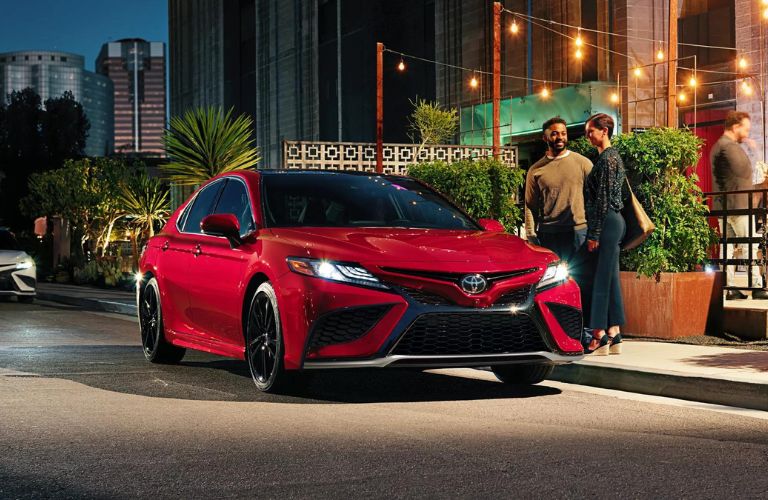 One red color Toyota Camry car is shown.